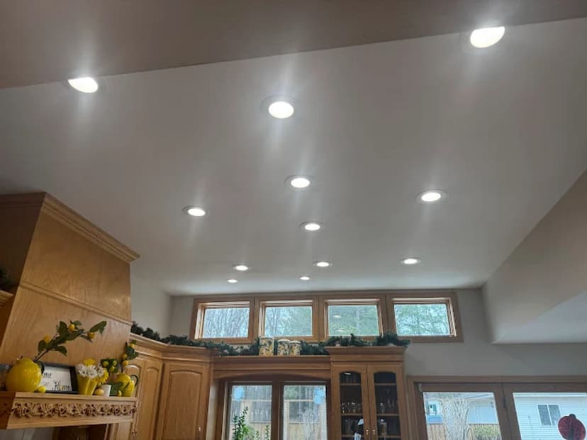 Home with trees and an orange sunset